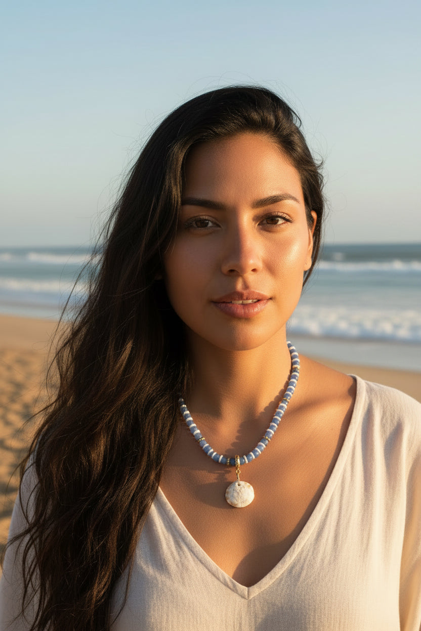 Faceted beaded necklace with shell pendant