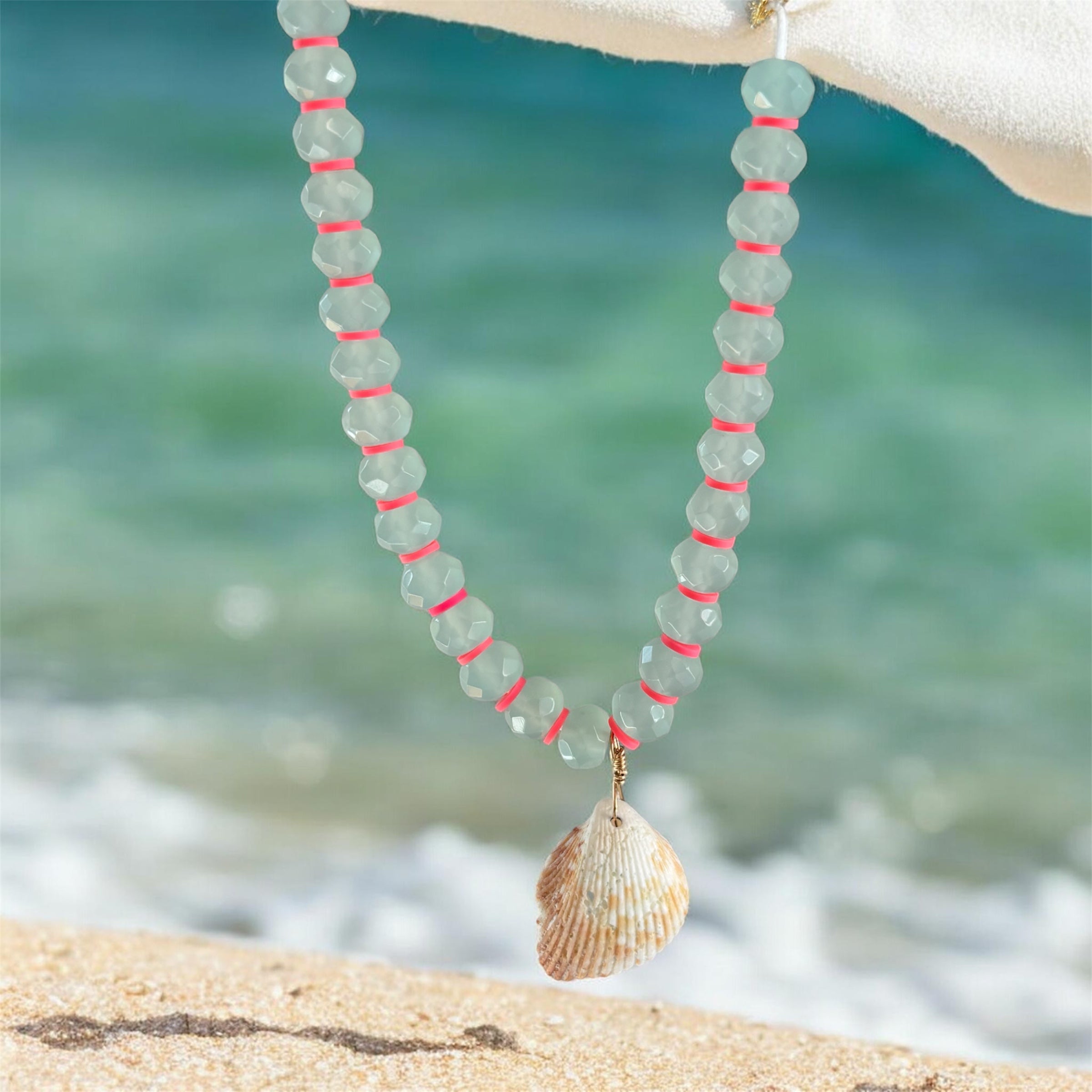 Faceted bead Necklace with shell pendant